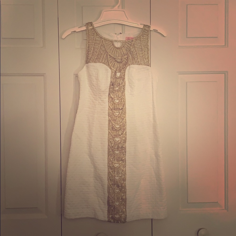 Bright white Lilly dress with golden flash